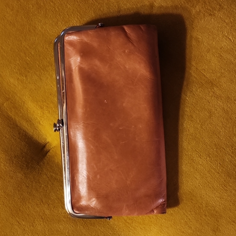 Used Hobo clutch wallet - salmon orange
